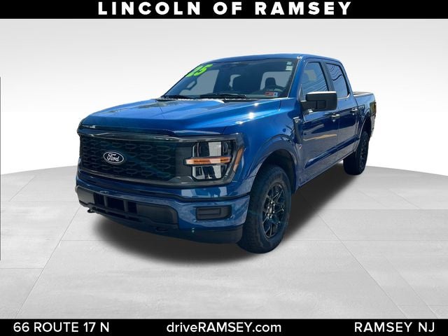 2025 Ford F-150 STX in Blue Metallic — front three-quarter view