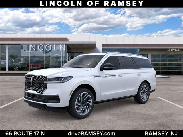 2026 Lincoln Navigator Reserve in Star White Metallic Tri-Coat — front three-quarter view